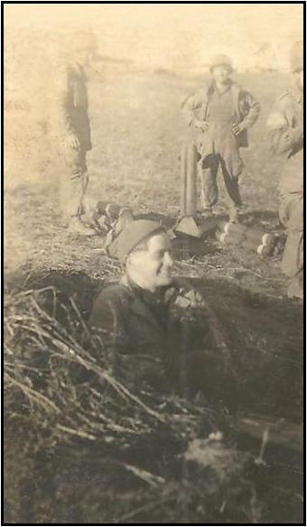 Private Charlie Johnson in foxhole. Sicily 1943